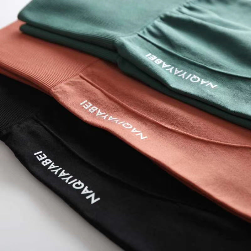 Pantalones cortos de yoga de cintura alta y secado rápido para mujer